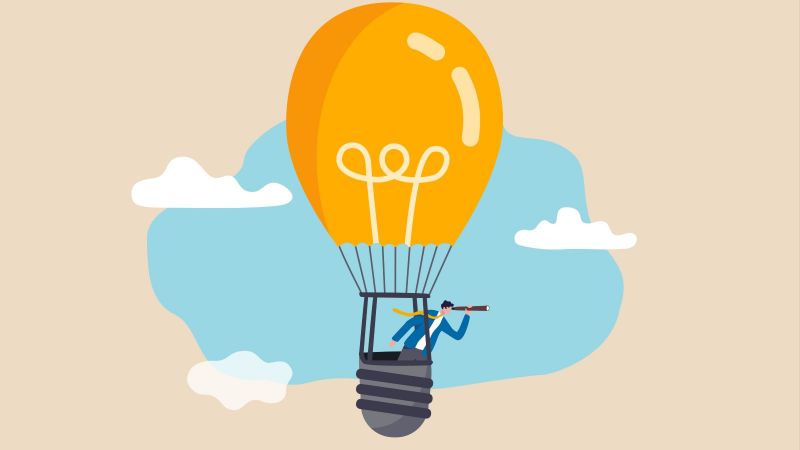 Symbolbild/Cartoonbild: Eine Glühbirne als Heißluftballon
